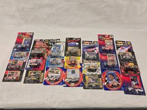 lot 32 image: (21) 164 Scale Nascar Collectables with Display Stand and Trading Cards
