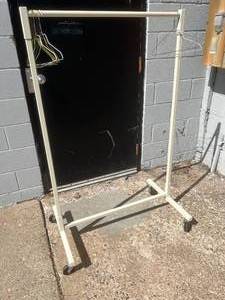 lot 17 image: Bar Ray Clothes Garment Rack - Easy to Move Around, Space Saver, Supports Significant Amount of Weight for Clothes - Great Condition 