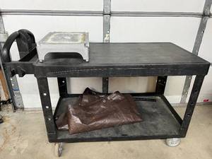 lot 51 image: MSRP $400 Rubbermaid Heavy-Duty Commercial Maintenance Utility Cart -&nbsp25-12 x 44 x 33 H&nbspDurable Construction, High Weight Capacity - Good Condition - Needs Minor Clean Up Includes Step Stool & Tarp