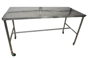 lot 50 image: Shambaine Company Rolling Stainless Steel Table - Robust Corrosion-Resistance, Ideal for Demanding Environments, Sleek Professional Appearance - Great Condition