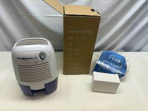 lot 19 image: Mini Dehumidifier