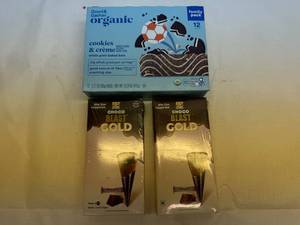 lot 59 image: 2x Choco Blast Gold & 1x Good & Gather Organic Cookies & Cream Bars