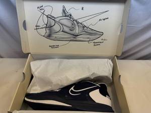 lot 99 image: Size 15 Kyrie Low 5 TB Promo