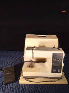 lot 50 image: Kenmore Sewing Machine in case