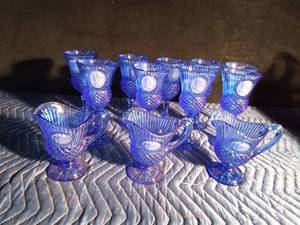 lot 52 image: 9 Blue Avon goblets and 3 small blue Avon pitchers