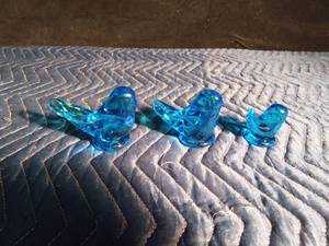lot 53 image: 1994,2001, and 2007 Uranium signed Leoward blue glass birds