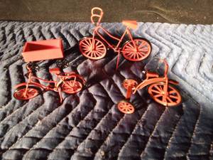 lot 75 image: Miniature red metal bicycles, tricycle and wagon
