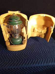 lot 82 image: 1973 Coleman green lantern with yellow case, key and funnel
