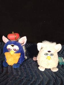 lot 128 image: 2000 Royal Majesty Furby and 1999 Baby Curly Sheep Furby