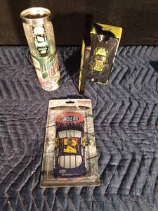 lot 130 image: NASCAR 2005 Mountain Dew Can with Casey #9 Die Cast
