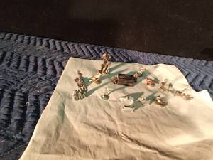 lot 132 image: Monopoly Pieces and Several Mini Pewter Pieces