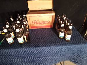 lot 103 image: 22 Vintage Hamms bottles in original case