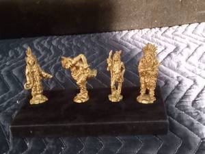 lot 137 image: 4 - Gold Tone Metal Native American Statues
