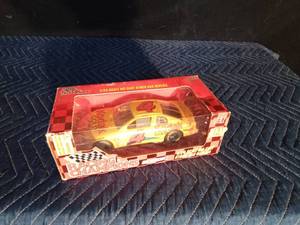 lot 121 image: 1997 Nascar Chevy #4 Sterling Marlin die cast race car (Never been out of the box)