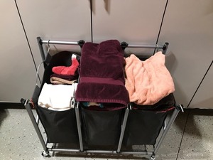 lot 374 image: 3 Bin Laundry Hamper Full of Bath, Beach, Hand and Dish Towels