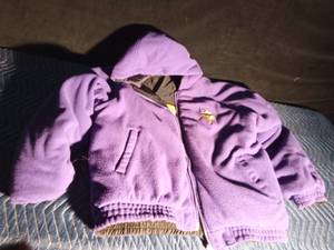 lot 185 image: NFL quilted Viking jacket with pompom gloves
