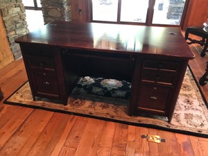 lot 14 image: Solid wood desk with 6 drawers and 1 slide out tray. (smoke free) with 4 keys