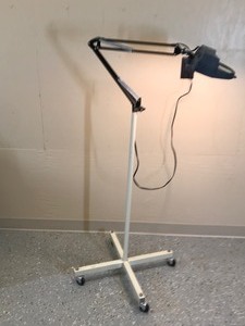 lot 306 image: floor lamp with magnifying glass on wheels