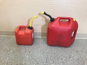 lot 303 image: 5 and 2 gallon gas cans