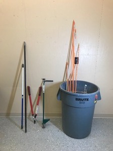 lot 300 image: Rubber-maid 44 gal. trash cans, the weed hound, Vigaro branch cutter and more