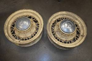 lot 19 image: 2 Kelsey Hayes Bent Spoke Wire Wheels with Caps