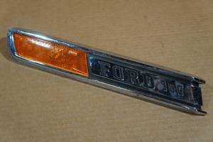lot 34 image: Ford 100 Truck LH Side Emblem - 1967-72