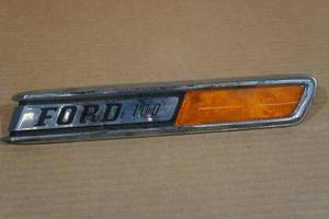lot 35 image: Ford 100 Truck RH Side Emblem - 1967-72