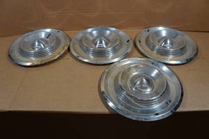 lot 49 image: 1950s Chrysler Hub Caps