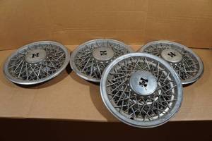 lot 51 image: Wire Spoke Hub Caps