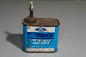 lot 82 image: Vintage Ford Lock Lubricant Can