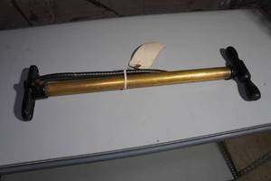 lot 135 image: Antique Ford Brass Tire Pump