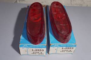 lot 184 image: 1959 Pontiac NORS Tail Light Lenses