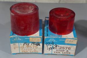 lot 193 image: Early 1960s Plymouth NORS Tail Light Lenses