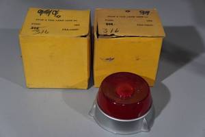 lot 195 image: 1952 Ford NORS Tail Light Lenses