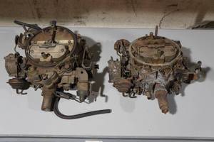 lot 212 image: 2 Rochester Quadrajet Four Barrel Carburetors