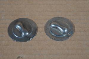 lot 459 image: Model A Crank Hole Covers