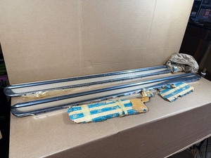 lot 1N image: Pair of NOS 1965 Chevy Corvette Rocker Panel Mouldings (wo Side Exhaust)