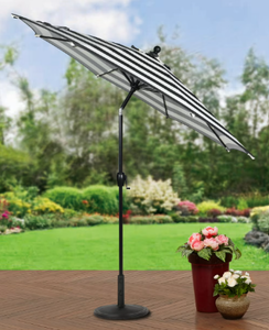 lot 118 image: Better Homes & Gardens Outdoor 9 Ibiza Stripes Round Crank Premium Patio Umbrella