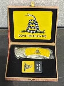 lot 28 image: Dont Tread on Me Knife & Lighter Set