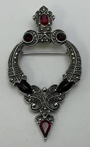 lot 94 image: Antique Lady Remington Brooch