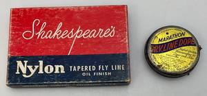 lot 102 image: Vintage Shakespeare Nylon Tapered Line Box (With Line) & Marathon Dryline Dope Tin With Some Contents
