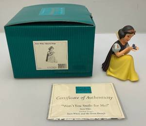 lot 188 image: EST. $85.00-$120.00 Vintage WDCC SNOW White Wont You Smile For Me Figurine With COA In Original Box