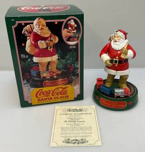 lot 250 image: Collectible Coca-Cola Santa Claus Mechanical Bank (NIB)