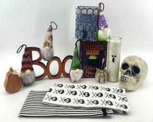 lot 50 image: Halloween Decor Collection with Gnomes, Skull, Candle, and Towels