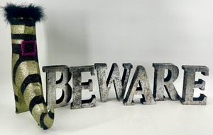 lot 51 image: Glittered Witch Boot and BEWARE Table Sign