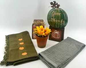 lot 53 image: Fall Harvest Decor Collection with Pumpkin Motifs and Sunflower Arrangement