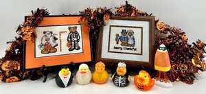 lot 169 image: Halloween and Thanksgiving Decor Set with Framed Cross Stitch, Rubber Ducks, and Garland