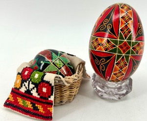 lot 52 image: Set of 2 Hand-Painted Ukrainian Pysanky Eggs with Basket and Stand