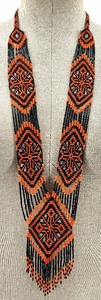lot 57 image: Beaded Ukrainian Necklace with Orange and Black Geometric Pattern