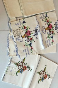 lot 105 image: Set of NOS Hand Embroidered Table Linens and Runners - Vintage Designs
